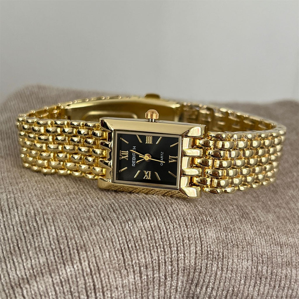 Golden Quartz Rectangular Watch With A Steel Band For Women